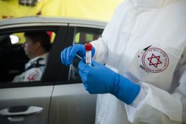 Pierwszy przypadek nowego szczepu koronawirusa wykryty w Izraelu, fot. Getty Images/Amir Levy
