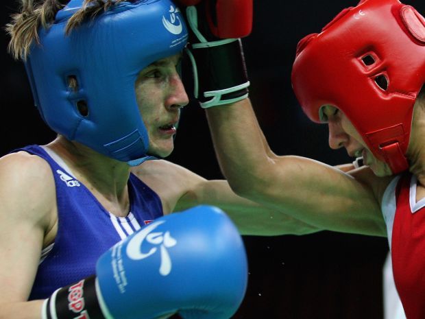Karolinę Michalczuk (L) na pewno zobaczymy na olimpijskim ringu w Londynie (fot. Getty Images)