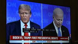 President of the United States Joe Biden and Former President Donald Trump's first Presidential Debate is displayed on a TV. Photo: Celal Gunes/Anadolu via Getty Images