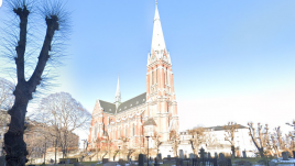 The soaring spire of St. John’s church dominates central Stockholm. Photo: Google Street View