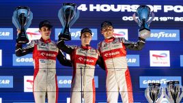 Robert Kubica (R), Louis Deletraz (C), Jonny Edgar (L) pose with their trophies. Photo: GERMAIN HAZARD/PAP/Panoramic