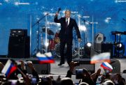 Президент России Владимир Путин обращается к собравшимся во время митинга, посвященного четвертой годовщине аннексии Россией украинского Крыма. Севастополь, 2018 год. Фото: Максим Шеметов / Reuters / Forum