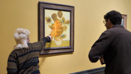 Activists throwing tomato soup at Van Gogh's painting. Photo: Just Stop Oil/ X