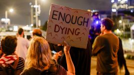 People stage a demonstration demanding that the Israeli government accept proposal for a ceasefire and a prisoner exchange agreement in Tel Aviv, Israel on May 6, 2024. Photo by Nir Keidar via Getty Images. 