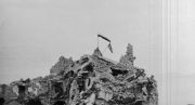 A Polish flag flies alongside a Union Jack. Photo: public domain. 