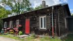 Trio of historic wooden houses handed protection in Warsaw 