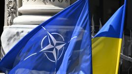 The flags of NATO and Ukraine. Photo: STR/NurPhoto via Getty Images