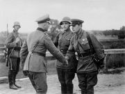 Soviet and German officers greet each other following the carve-up of Poland. Photo: Wikicommons / public domain  