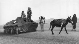 1979, A group of Afghan soldiers with Soviet Army tank stop in the desert with a donkey, Afghan Civil War. (Photo by Getty Images/Getty Images)