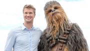 Joonas Suotamo (L) poses with Chewbacca—the character he plays in the film "Solo: A Star Wars Story". Photo:  Stephane Cardinale - Corbis/Corbis/Getty Images