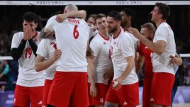 The Polish team celebrate after reaching the Olympic final. Photo: PAP/Adam Warżawa