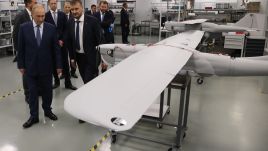 Russian President Vladimir Putin observes an exhibition of Orlan-10 UAV drones. Photo by Contributor/Getty Images