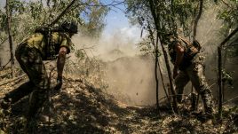 Ukrainian soldiers on the frontlines. Photo by Jose Colon/Anadolu via Getty Images