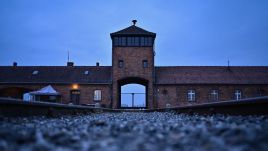 A view of the main entrance and train track at the former Nazi death camp Auschwitz Birkenau on January 26, 2023 in Oswiecim, Poland. International Holocaust Remembrance Day, 27 January, is observed on the anniversary of the liberation of Auschwitz-Birkenau, the largest Nazi death camp. Photo by Omar Marques/Getty Images