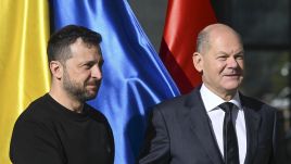 Ukrainian President Volodymyr Zelenskyy meets German Chancellor Olaf Scholz in Berlin on Friday. Photo by Halil Sagirkaya via Getty Images 