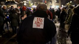 A protester wears a sticker reading 'Corruption kills' during a rally of support for the victims of the Novi Sad railway station accident in Belgrade. Photo: PAP/EPA/ANDREJ CUKIC